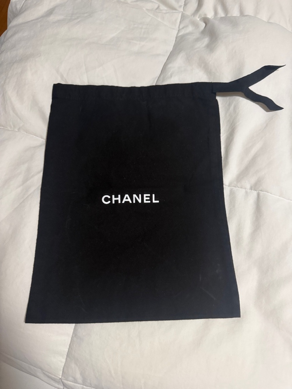 CHANEL Black Drawstring Pouch with White Logo